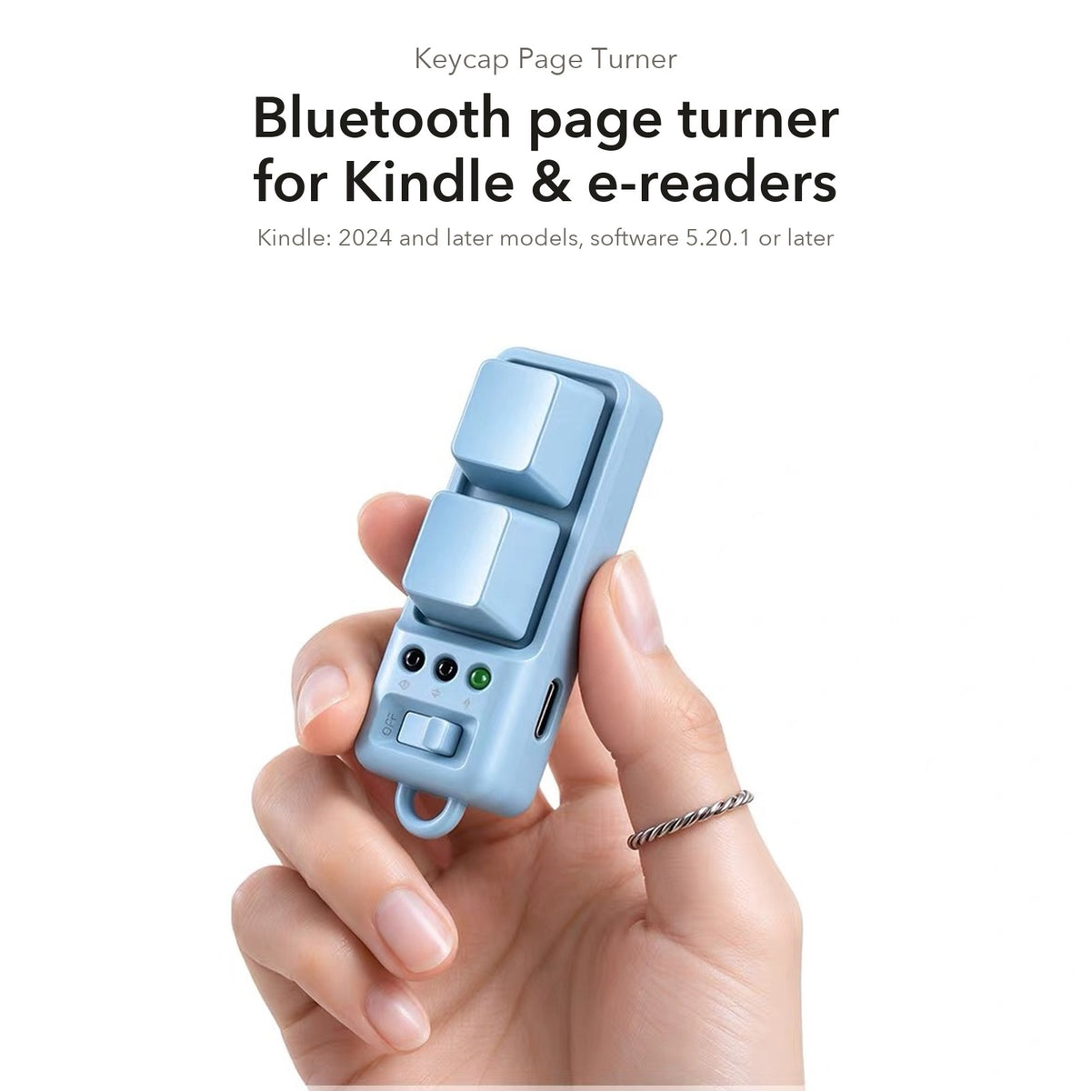 Keycap Page Turner for Kindle & E-Readers — held in hand